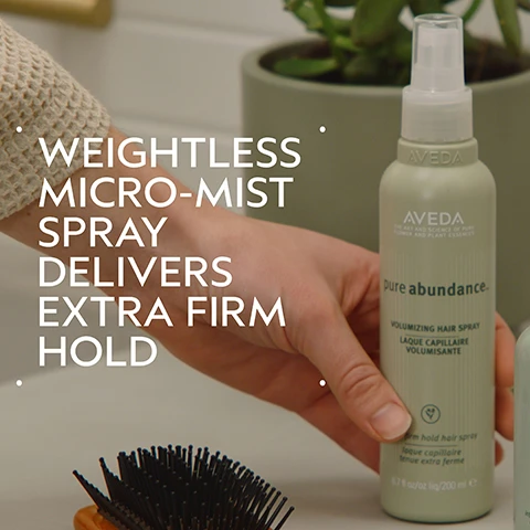 Image 2 - A hand holds a light green AVEDA spray bottle with a white cap, blurred in the background are a plant and a hairbrush, and the image displays text that reads WEIGHTLESS MICRO-MIST SPRAY DELIVERS EXTRA FIRM HOLD, while the bottles label also states AVEDA THE ART AND SCIENCE OF PURE FLOWER AND PLANT ESSENCES, pure abundance. VOLUMIZING HAIR SPRAY LAQUE CAPILLAIRE VOLUMISANTE, firm hold hair spray laque capillaire tenue extra ferme, 6.7 fl oz/oz liq/200 ml e. Image 3 - A dark green graphic features a central white circle filled with abstract swirling green and blue colors, alongside white text that reads ACACIA GUM & KAOLIN CLAY HELPS FILL OUT FINE HAIR. Image 4 - A split image shows a young woman with shoulder-length reddish-brown hair; on the left labeled BEFORE Unwashed Hair, her hair is flat, and on the right labeled AFTER Results with Pure Abundance™ Volumizing Shampoo, Volumizing Clay Conditioner, Style-Prep™, and Volumizing Hair Spray, Phomollient™ Styling Foam. Blow dried with Mini Wooden Paddle Brush, her hair is voluminous and styled. Image 5 - The image displays a four-step hair care routine with circular visuals: a person washing hair with shampoo, conditioner being dispensed into a hand, a person brushing styling foam into hair, and a person spraying hairspray, accompanied by the text: HOW TO USE 01 CLEANSE Pure Abundance™ Volumizing Shampoo 02 CONDITION Pure Abundance™ Volumizing Conditioner 03 STYLE Pure Abundance™ Style-Prep™ Phomollient™ Styling Foam & Mini Paddle Brush 04 HOLD Pure Abundance™ Volumizing Hair Spray. Image 6 - A side-by-side comparison shows a persons short, reddish-brown hair from behind, appearing flatter and less voluminous on the left, and noticeably fuller and styled on the right, with the visible text BEFORE, AFTER, Unwashed Hair, and Results with Pure Abundance™ Volumizing Shampoo, Volumizing Clay Conditioner, Style-Prep™, and Volumizing Hair Spray, Phomollient™ Styling Foam. Blow dried with Mini Wooden Paddle Brush. Image 7 - A clear, translucent liquid blob with small air bubbles visible on a white background. Image 8 - Three white certification logos are displayed against a dark green leafy background, reading 100% VEGAN, Certified B Corporation, and Cruelty Free INTERNATIONAL.