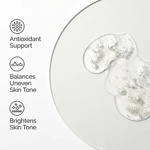 Image 1 - A clear liquid spill with bubbles is shown on a white background, next to three icons with text descriptions reading Antioxidant Support, Balances Uneven Skin Tone, and Brightens Skin Tone. Image 2 - A close-up of a man applying a clear serum to his right cheek, with text bubbles on the left listing Balancing, Brightening, and Age Support. Image 3 - A glass dropper filled with clear liquid and air bubbles is shown against a white background, with text that reads Key ingredient: Ascorbyl Glucoside and A gentle vitamin C derivative to brighten and even skin tone. Image 4 - The image displays a three-step regimen for uneven skin tone from The Ordinary, showing a white tube, an amber dropper bottle, and a gray tube with connecting lines, featuring visible text: A regimen for uneven skin tone; PREP ●○ Glucoside Foaming Cleanser, Cleanses skin and improves skin clarity, with product label text The Ordinary, Glucoside Foaming Cleanser, Gentle, Foaming Facial Cleanser, Nettoyant Moussant au Glucoside, Un nettoyant moussant et doux pour le visage; TREAT ●●○ Ascorbyl Glucoside Solution 12%, Brightens and balances uneven skin tone, with product label text The Ordinary, Ascorbyl Glucoside Solution 12%, A Brightening Serum with a Stabilised Vitamin C Derivative, Solution d’Ascorbyl Glucoside 12%, Un sérum éclaircissant à base de Dérivé de Vitamine C Stabilisée; SEAL ●●● Natural Moisturizing Factors + PhytoCeramides, Rich, nourishing moisturizer to strengthen the skin barrier, with product label text The Ordinary, Natural Moisturizing Factors + PhytoCeramides, Rich Surface Hydration Formula, Facteurs Naturels d’Hydratation + PhytoCéramides, Formule Riche d’Hydratation de Surface; each product also displays the text Clinical Formulations with Integrity, Formulations Cliniques Empreintes dIntégrité.