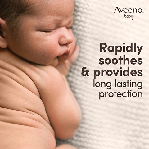 Image 1 - A peaceful baby is curled up on a textured white blanket, with the text that reads, Rapidly soothes & provides long lasting protection, and the logo for Aveeno baby.
Image 2 - A tube of Aveeno baby daily care nappy cream for sensitive skin is shown, featuring a light striped design, and accompanied by oat plants and promotional text, which states With oat extract, The power of oat for baby’s sensitive skin, and the product volume of 100 ml.
Image 3 - A close-up image of a baby wrapped in a soft blanket with text that reads contains zinc oxide, known to create a breathable barrier to protect the skin.
Image 4 - Image shows a tube of Aveeno Baby daily care nappy cream for sensitive skin with illustrations and text stating Unscented, Formula free from dyes, and High tolerance formula, along with a badge that reads Pediatrician & Dermatologist Tested.
Image 5 - Two Aveeno Baby products are displayed, including a bottle of daily care hair and body wash and a tube of daily care nappy cream, with visible text that reads Soothe & protect your babys sensitive skin from Day 1.