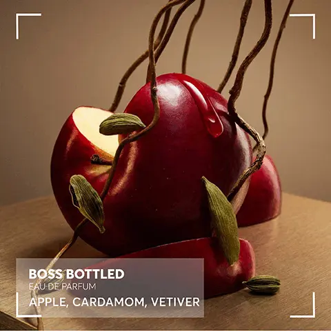 Image 1, L BOSS BOTTLED EAU DE PARFUM APPLE, CARDAMOM, VETIVER Image 2, BOSS BOTTLED BOSS BOSS EAU DE TOILETTE EAU DE PARFUM PARFUM BOSS ELIXIR SCENT MOOD Fresh & Masculine Fresh & Refined Worm & Sophisticated SCENT FAMILY Fruity Woody SCENT NOTES Apple Cinnamon, Woods Woody Spicy Apple. Cardamom, Vetiver Woody Ambery Orris, Cedarwood, Vegetal Leather Rich & Charismatic Ambery Woody Incense, Vetiver, Cedarwood INTENSITY LEVEL MIXI33 031110.