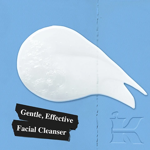 Image 1 - A white, teardrop-shaped smear of foamy facial cleanser with small bubbles is spread across a light blue background, with the text Gentle, Effective Facial Cleanser written on a black torn-edge label. Image 2 - A blue background split vertically shows two black banners with GENTLY CLEANSES on the left, and a white Kiehls Ultra Facial Cleanser tube on the right with text that reads KIEHLS SINCE 1851 ULTRA FACIAL CLEANSER Gentle Liquid Formula that Cleanses without Over-drying or Stripping Skin for all skin types 5.0 fl. oz. - 150 ml. Image 3 - The image displays a sliced avocado with yellow oil pouring over it, several apricot kernels, and transparent shapes resembling water bubbles on a blue background, with the text Our Formula With: Squalane Apricot Kernels Avocado Oil.