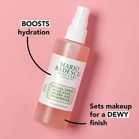Image 1 - A pink background features a bottle of Mario Badescu facial spray labeled BOOSTS hydration and Sets makeup for a DEWY finish, containing 4 fl oz of product with aloe, herbs, and rosewater.
Image 2 - An arrangement of pink rose petals and green thyme leaves is displayed, with text describing three extracts: rejuvenating rose canina seed extract, clarifying thyme extract, and mineral-rich + skin-softening bladderwrack (seaweed) extract.