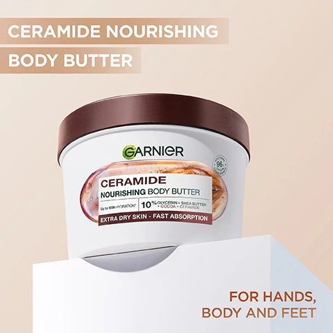 Image 1 - A tub of Garnier Ceramide Nourishing Body Butter is shown with the text CERAMIDE NOURISHING BODY BUTTER, Garnier, CERAMIDE NOURISHING BODY BUTTER, Up to 100h HYDRATION*, 10% GLYCERIN + SHEA BUTTER + COCOA + CERAMIDE, EXTRA DRY SKIN - FAST ABSORPTION, NATURAL 96% ORIGIN INGREDIENTS, and FOR HANDS, BODY AND FEET. Image 2 - A split image shows a shoulder before and after treatment, with an icon of a drop and lines, and the text HYDRATES UP TO 10 CELL LAYERS DEEP* BEFORE AFTER *up to 10 cell layers of the stratum corneum. Image 3 - Visual representation of ingredients with a translucent capsule containing cocoa beans and liquid and the text INGREDIENTS: GLYCERIN CERAMIDE SHEA BUTTER COCOA BUTTER. Image 4 - A white tub of Garnier Ceramide Nourishing Body Butter with a swirl of product on top is centered against a creamy swirling background with the text INTENSE MOISTURE BOOST, GARNIER, CERAMIDE NOURISHING BODY BUTTER, NATURAL 96% ORIGIN INGREDIENTS, Up to 100h HYDRATION*, 10% GLYCERIN + SHEA BUTTER + COCOA + CERAMIDE, EXTRA DRY SKIN - FAST ABSORPTION visible on the product label and background. Image 5 - A hand holds a tub of Garnier body butter with cream swatched on it, and visible text reads FORMULATED FOR EXTRA DRY SKIN, 10 HOURS HYDRATION, NOURISHING BODY CREAM FAST ABSORPTION, GARNIER, NATURAL 96% ORIGIN INGREDIENTS, CERAMIDE NOURISHING BODY BUTTER, Up to 100h HYDRATION*, 10% GLYCERIN + SHEA BUTTER + COCOA + CERAMIDE, EXTRA DRY SKIN - FAST ABSORPTION. Image 6 - The image shows two tubs of Garnier body butter, one labeled Ceramide Nourishing Body Butter and the other Body Superfood 48h Repairing Butter, along with the text NEW PACK. SAME GREAT RESULTS, Garnier CERAMIDE NOURISHING BODY BUTTER, Up to 100h HYDRATION*, 10% GLYCERIN + SHEA BUTTER + COCOA + CERAMIDE, EXTRA DRY SKIN - FAST ABSORPTION, Garnier Body SUPERFOOD 48h REPAIRING BUTTER, COCOA + CERAMIDE, HYDRATE SKIN UP TO 10 LAYERS DEEP, Very Dry Skin Fast-absorption, Cruelty Free International, VEGAN FORMULA, 380ml e, NATURAL 96% ORIGIN INGREDIENTS, and NATURAL 97% ORIGIN INGREDIENTS.