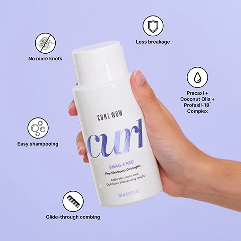 A hand holds a white bottle of Curl Wow Snag-Free Pre-Shampoo Detangler, with surrounding text describing benefits as No more knots, Easy shampooing, Glide-through combing, Less breakage, and ingredients Pracaxi + Coconut Oils + Profaxil-18 Complex. The bottle also displays the text CURL WOW curl SNAG-FREE Pre-Shampoo Detangler Adds slip, saves time Optimizes shampooing results 295 ml e 10 fl oz.