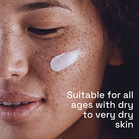 Image 1 - A close-up of a woman applying cream to her cheek, with visible text that reads Suitable for all ages with dry to very dry skin.
Image 2 - A woman with curly hair is smiling with her eyes closed, and the image includes the text Hydrates for 48 hours and fully restores the skin barrier.
Image 3 - An illustration featuring a light green background with a swirl of cream, highlighting three key ingredients: B3 labeled Niacinamide with a note to Restore, B5 labeled Panthenol Pro-Vitamin B5 with a note to Soothe, and E labeled Vitamin E with a note to Soothe.
Image 4 - A person in a white coat holds a tube of Cetaphil Rich Night Cream, with text on the left side stating No added fragrance, non irritating & vegan.
Image 5 - Image of Cetaphil products arranged to illustrate a sensitive skin routine, featuring a bottle of Olly Skin Cleanser, a tube of Daily Defence Moisturizer SPF 50, and two additional products labeled for cleansing, targeting, moisturizing, and protecting, with the text Sensitive Skin Routine at the top and step instructions alongside each product.
Image 6 - A hand is holding a tube of Cetaphil Rich Night Cream, dispensing cream into a waiting hand, with the text Suitable for all skin types displayed next to it.
Image 7 - An image of a Cetaphil Rich Night Cream tube displayed against a blurred background, accompanied by a stack of colorful washcloths; the text on the image states 5 SIGNS SKIN SENSITIVITY and DEFENDS AGAINST Dryness Irritation Roughness Tightness Weakened Skin Barrier.
Image 8 - Logo for Cetaphil featuring green and blue curves, with the text leading dermatologist recommended sensitive skin brand.