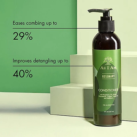 Image 1 - A bottle of As I Am Rosemary Conditioner is displayed on light-colored steps against a green background, with text indicating it eases combing up to 29% and improves detangling up to 40%.
Image 2 - A person holds a bottle of rosemary conditioner labeled As I Am with icons indicating it is vegan and cruelty-free, sulfate-free, and has a natural fragrance.