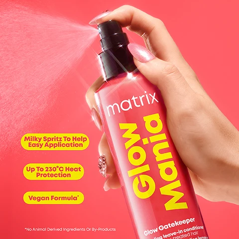 Image 2 - A hand holding a spray bottle labeled matrix Glow Mania against a bright pink background, with visible text stating Milky Spritz To Help Easy Application, Up To 230°C Heat Protection, and Vegan Formula.
Image 3 - Image shows the back view of a persons head with curly hair, split into two sections labeled Before on the left and After on the right, both set against a pink background, with small text at the bottom stating *When Used With A System Of Shampoo, Mask And Leave-in.
Image 4 - A split coconut with a white interior sits alongside a sliced grapefruit, a piece of grapefruit, a mango, and fresh geranium flowers, with the texts Sweet Coconut Water, Juicy Mango, Sparkling Grapefruit, and Fresh Geranium arranged around the fruits on a pink background.
Image 5 - Image shows a flat lay of four hair care products from the Matrix Glow Mania line against a bright red background, labeled as Step 1 Shampoo & Conditioner, Step 2 Mask, and Step 3 Leave-In Conditioner, with accompanying product descriptions.