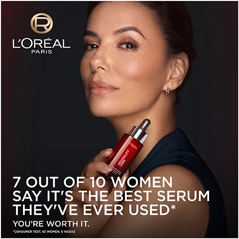 Image 1 - A woman with long, dark hair is shown applying serum to her face, holding a red serum bottle, with LOréal Paris branding and text stating 7 out of 10 women say its the best serum theyve ever used, followed by you’re worth it.
Image 2 - An image comparing two formats of LOréals Tri-Peptides Supersized Serum, featuring a red dropper bottle labeled as STANDARD FORMAT next to a larger red bottle labeled SUPERSIZED FORMAT, with text CREATED BY EXCLUSIVE SUPERSIZED FORMAT LORÉAL PARIS at the bottom.
Image 3 - A bottle of LOreal Revitalift Laser anti-ageing serum is shown against a red background, with beams of light emanating from it and text indicating the products benefits, which include visible results on wrinkles, smoothness, firmness, and evenness.
Image 4 - An image of a red cosmetic cream container with the text describing its formula, highlighting three key ingredients: Argilene Peptide helps relax features to smooth expression lines, Hyaluronic Acid replumps skin, and Vitamin C boosts skins radiance.
Image 5 - A close-up image of a womans face with a serious expression, partially lit with red light, accompanied by text that reads INSPIRED BY PROFESSIONAL TREATMENTS TO FIGHT ALL KEY AGEING SIGNS followed by the words WRINKLES & LINES, SMOOTHNESS, FIRMNESS, PLUMPNESS, EVENNESS, RADIANCE on the left side.
Image 6 - An image featuring a red bottle of LOréal Revitalift Serum with a dropper and a red jar of Triple Action Cream alongside text that reads AGE-CORRECTING ROUTINE FOR WRINKLES, FIRMNESS AND EVENNESS, with labels for Step 1 and Step 2 indicating the products.
Image 7 - A dropper bottle with a red serum is shown against a red background, accompanied by the text that includes SILKY & LIGHTWEIGHT TEXTURE, QUICK ABSORPTION, ULTRA HYDRATING, and NON-GREASY & NON-STICKY.
Image 8 - An infographic promoting LOréal Paris Skin Science, featuring icons for clinical efficacy and animal testing, with text stating independently proven clinical efficacy, tolerance validated by more than 600 applications, and LOréal has been committed to beauty without animal testing since 1989.