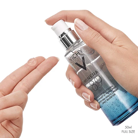 Image 3 - A person is holding a bottle of Vichy Mineral 89 while dispensing a small amount of gel onto their fingertip, with visible text indicating 50ml and FULL SIZE on the bottom right.
Image 4 - Image shows bubbles representing hyaluronic acid on the left and a textured water surface on the right, with the text Hyaluronic Acid + Millions of Minerals, Hydrates & Plumps Skin, Strengthens & Repairs Skin Barrier.
Image 5 - A clear jar of Vichy Minéral 89 72H Moisture Boosting Cream is shown, accompanied by the text that states +60% instant hydration, up to 72H moisture lock-in, fragrance-free, and size of 15ml.
Image 6 - A tube of Vichy Capital Soleil UV-Age Daily Invisible SPF Water Fluid with a white and silver design, featuring the text SPF 50+, UV-AGE DAILY, ANTI PHOTO-AGEING WATER FLUID, and details about advanced UV protection for anti-ageing.