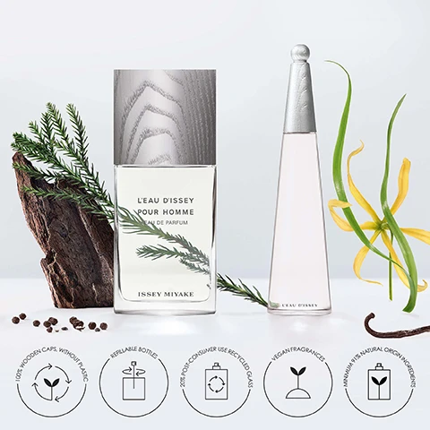 Image 1 - A fragrance bottle labeled LEau dIssey Pour Homme sits beside a smaller, elongated bottle, with green leaves and wood pieces nearby, and visible text includes 100% wooden caps, refillable bottles, 20% post-consumer use recycled glass, vegan fragrances, and minimum 97% natural origin ingredients.
Image 2 - An image featuring six bottles of Issey Miyakes LEau dIssey pour homme fragrances, labeled with their names and scent descriptions, including Eau de Toilette, Eau de Toilette Intense, and Eau de Parfum variants like Eau&Cèdre and Wood&Wood, with a light background.